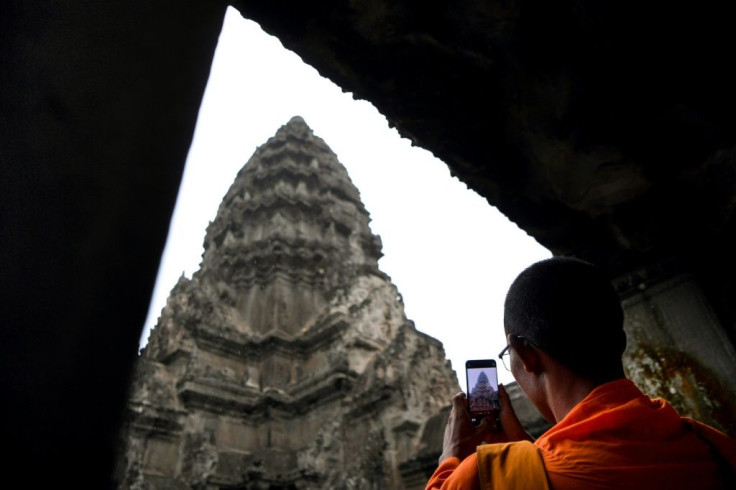 In Cambodia, nimble-footed gardeners help maintain the grandeur of Angkor Wat