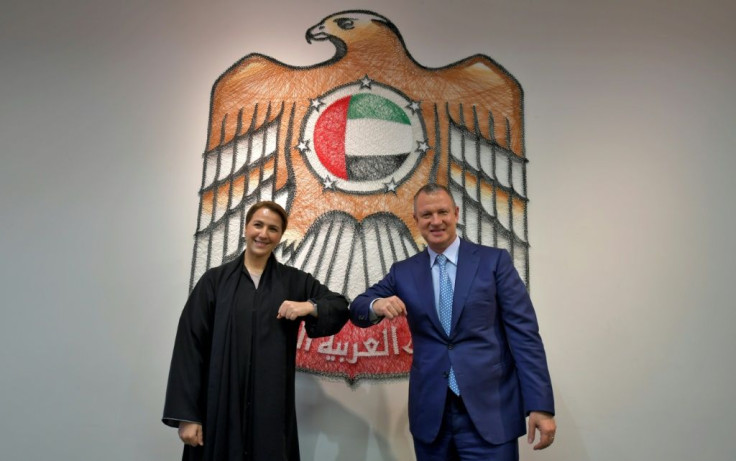 Emirati Minister of State for Food and Water Security Mariam al-Muhairi (L) and Erel Margalit, founder and chairman of Jerusalem Venture Partners (JVP)