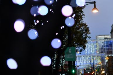 The Christmas lights illuminate the main shopping Oxford Street in central London on November 2, 2020. British Prime Minister Boris Johnson on Monday defended his belated decision to impose a second coronavirus lockdown as critics claimed he could have sa