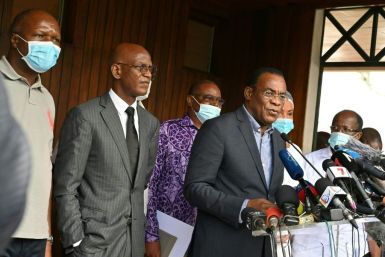 Opposition candidate Pascal Affi N'Guessan on Sunday called for a 'civilian transition' to end President Ouattara 10 years in power