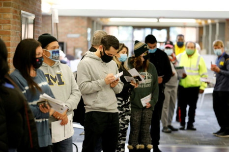 Voters line up to cast early ballots in West Bloomfield, Michigan