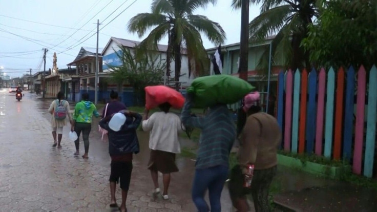IMAGES: Residents of the coastal city of Bilwi board up windows and head to shelters as Eta, which has strengthened to a Category 4 hurricane, bears down on the Caribbean coast of Nicaragua and Honduras, threatening the Central American countries with cat