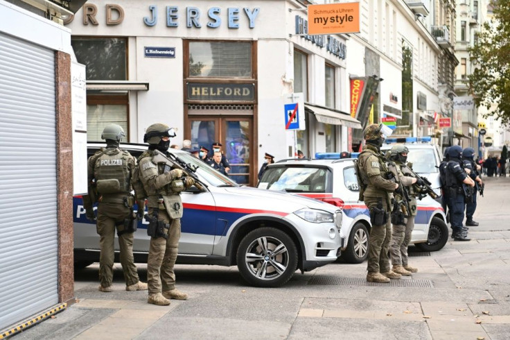 Policemen secure the area around a crime scene in Vienna on November 3, 2020, one day after the shooting at multiple locations across central Vienna.