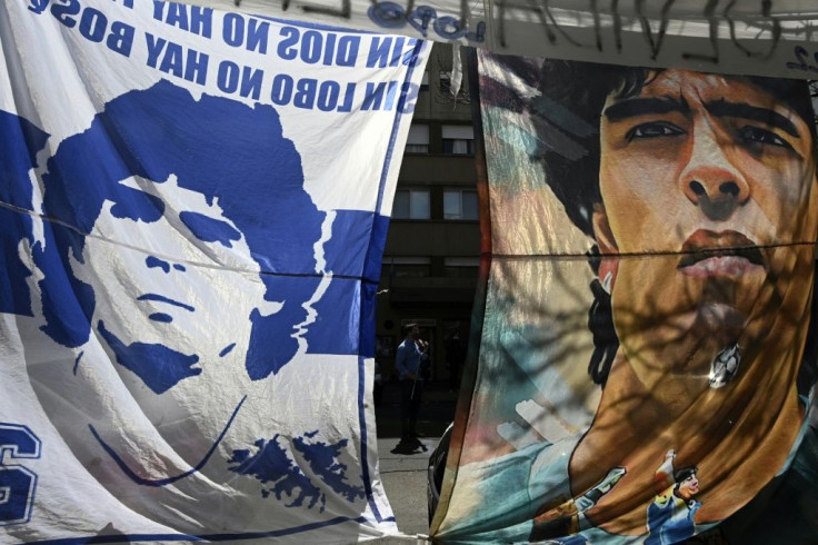 Fans of Gimnasia y Esgrima hung flags of Diego Maradona outside the clinic in La Plata, where the club is based and the football star was receiving treatment