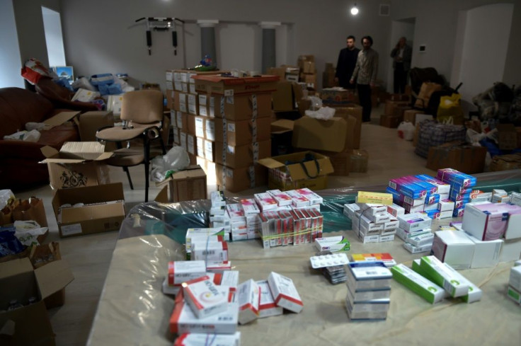 Donated medicines are packed into boxes at the Armenian embassy in Moscow in order to be sent as aid to Armenia
