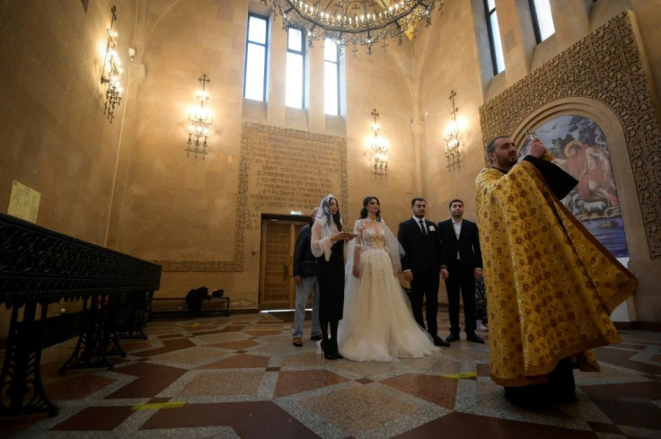 A wedding ceremony at an Armenian Christian church in Moscow on October 20, 2020.