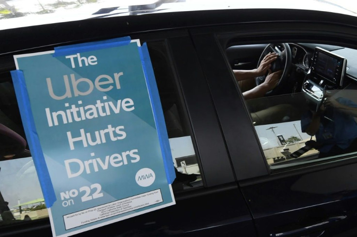California voters approved a referendum allowing ride-hailing giants to keep their model of using independent contractors, effectively overturning a state law requiring drivers to be classified as employees