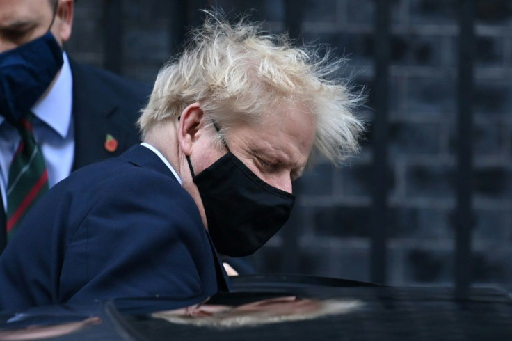 Britain's Prime Minister Boris Johnson leaving Downing Street for parliament on Wednesday