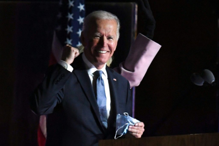Democratic presidential nominee Joe Biden greets suporters during a tense election night