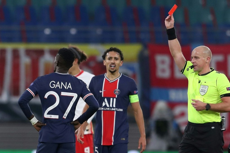 Idrissa Gueye (L) was one of two players sent off for PSG in Germany