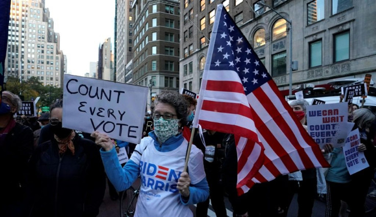 People gather at Fifth Avenue during a "Count Every Vote" rally in New York on November 4, 2020, as Joe Biden approaches the necessary electoral votes to win the presidency