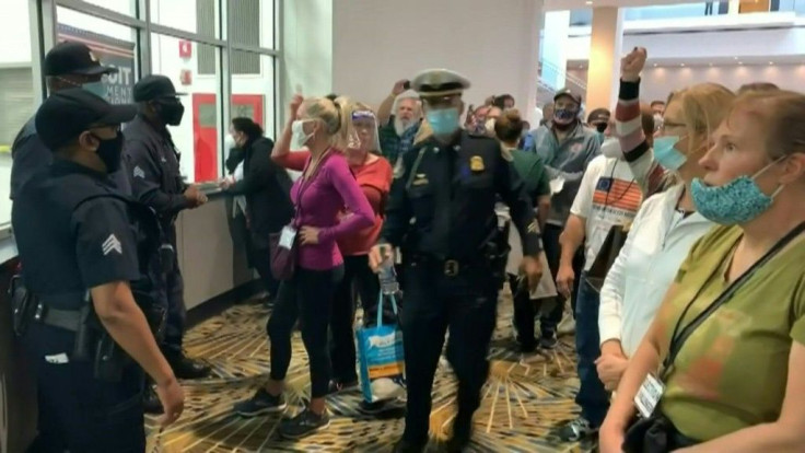 Protesters chant "Stop the count" outside an election facility in Detroit, Michigan, after President Donald Trump's campaign said it asked a court to stop counting votes in this pivotal state where Democrat Joe Biden holds a thin lead.