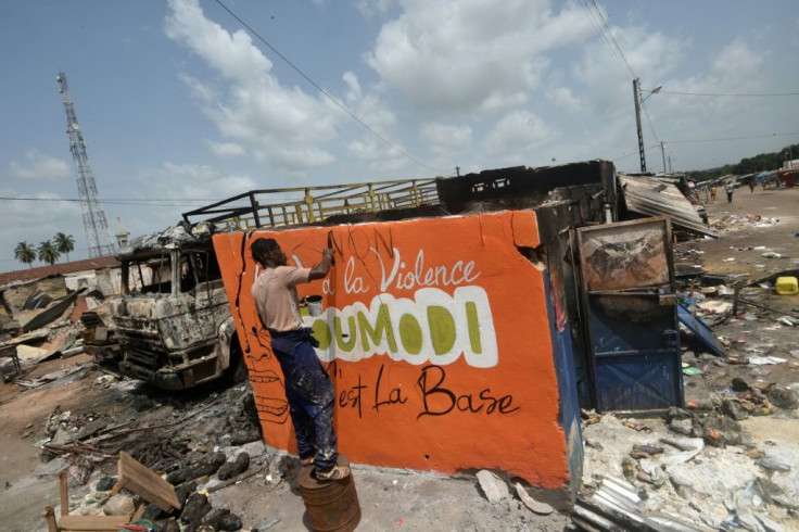 After the clashes, activists sprayed messages of peace on the town's walls