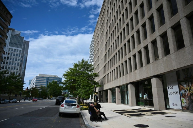 The sidewalk is empty outside the IMF and World Bank headquarters amid the coronavirus pandemic on October 1, 2020 in Washington