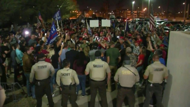 Pro-Trump protesters gather outside an Arizona vote-counting center