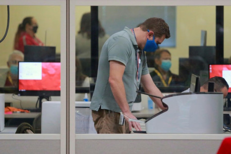 A worker handles official ballots at the Clark County Election Department on November 5, 2020, in North Las Vegas