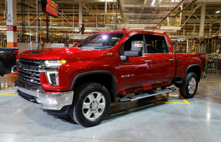 General Motors reported a jump in third-quarter profits on strong sales of the Chevy Silverado and other large vehicles