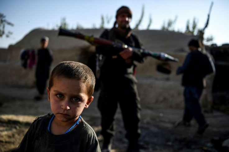The village of Aziz Abad sits on the frontline of Afghanistan's war and has seen renewed fighting between government forces and Taliban in recent weeks