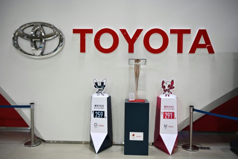 Toyota said it was revising up its sales and profit forecasts for the year as demand recovered qiucker than expected