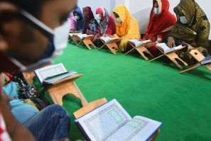 Transgender students busy with their studies at the Dawatul Islam Tritio Linger Madrasa in Bangladesh