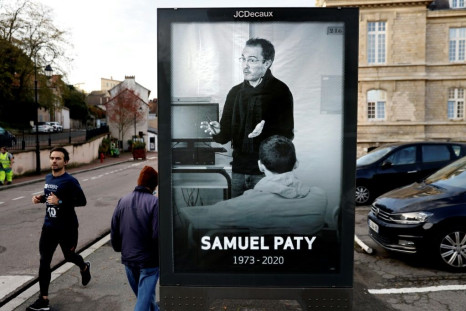 A bus stop tribute to French teacher Samuel Paty in Conflans-Sainte-Honorine, the Paris suburb where he was beheaded last month