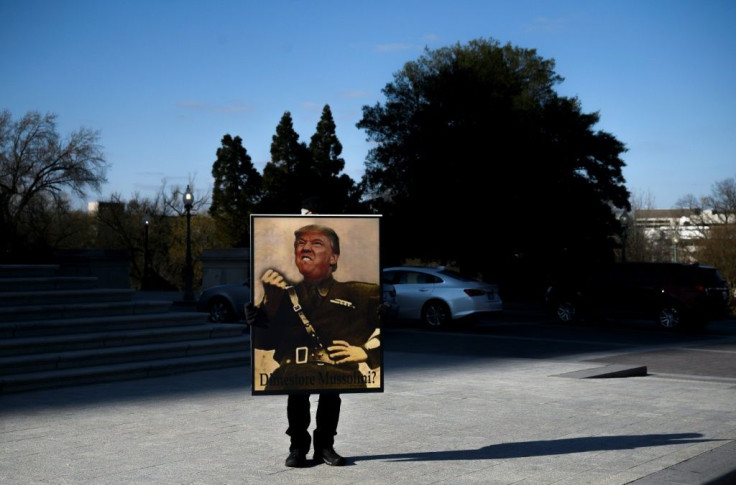 A protester mocked President Donald Trump during his impeachment trial