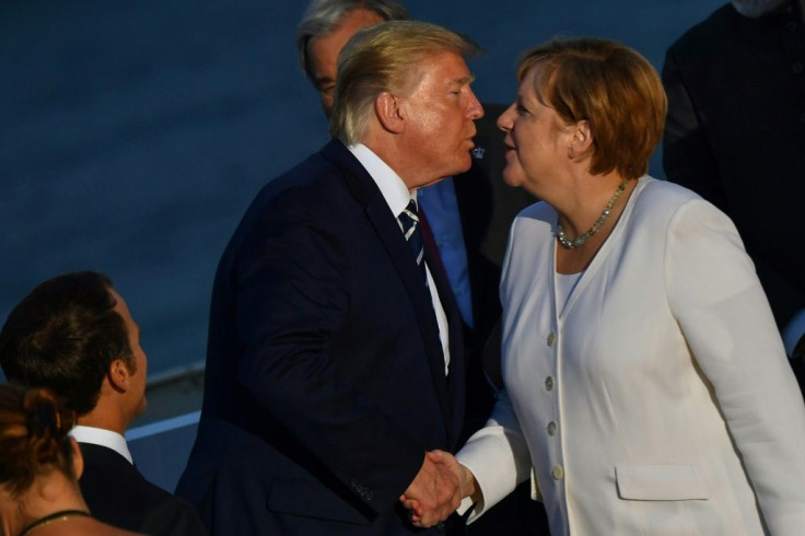 US President Donald Trump kisses German Chancellor Angela Merkel in greeting, but more often their relationship has been frosty and tense