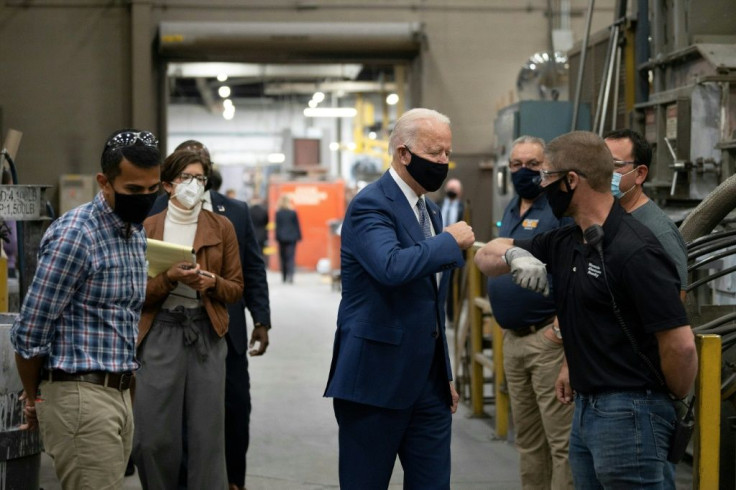 Biden's campaigning was scaled down in 2020, and he traded loud and crowded rallies for smaller affairs, like this tour of an aluminum plant in Wisconsin
