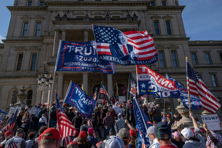 Donald Trump supporters rally at the State Capitol in Lansing, Michigan, after Joe Biden is declared winner of the presidential election