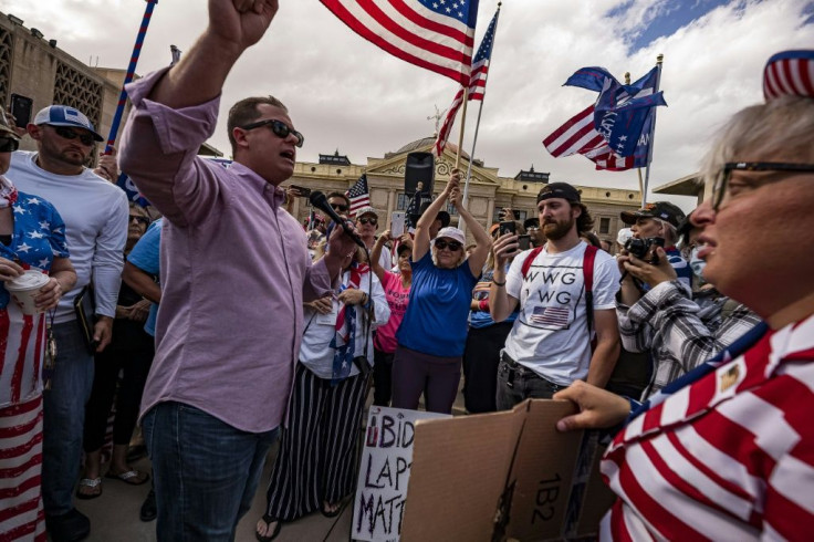 Supporters of US President Donald Trump demonstrate against the election results