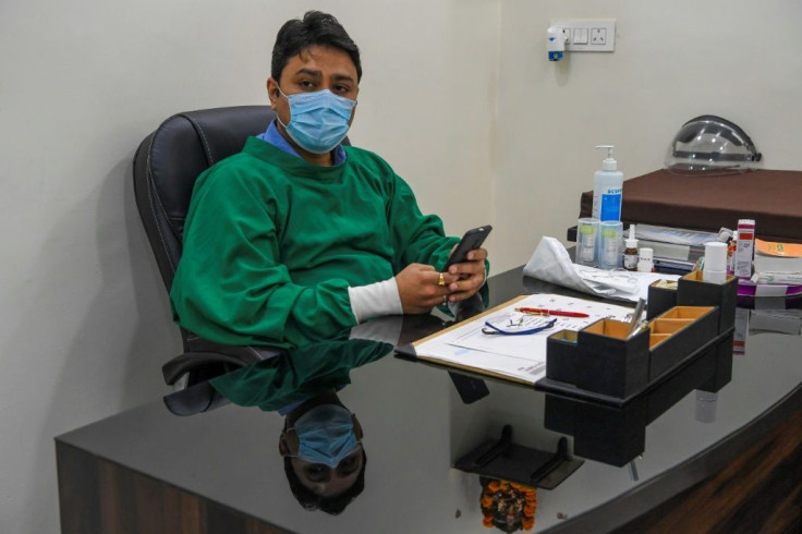 Davinder Kundra is among a growing number of doctors who are worried as New Delhi's notorious air again hits peak pollution levels while a new pandemic wave is battering hospitals