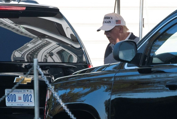 US President Donald Trump walks to his motorcade on the South Lawn of the White House