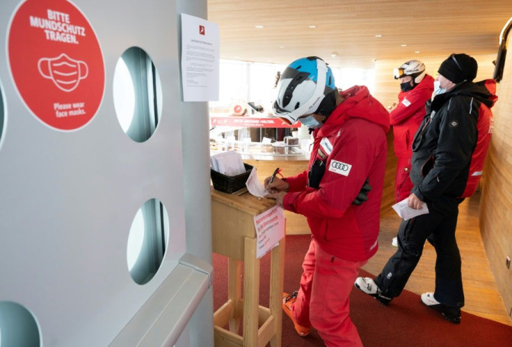 Skiers had to fill out forms to enter a cafe at the Pitztal glacier in Austria as part of Covid-19 safety measures