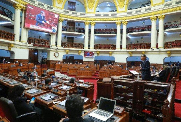 Peru's President Martin Vizcarra (R) defends himself against allegations of corruption in a speech to Congress ahead of his impeachment, November 2020