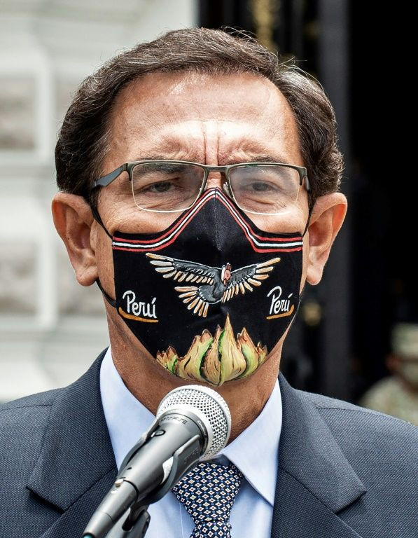 Vizcarra speaks outside the Congress after a speech defending himself against allegations that he received kickbacks ahead of his impeachment, in November 2020