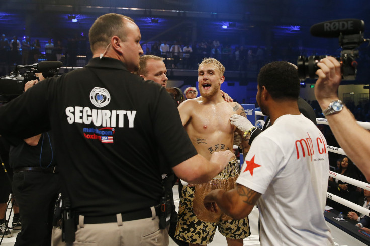 Jake Paul is separated from KSI after Paul defeated AnEsonGib in a first round knockout during their fight at Meridian at Island Gardens