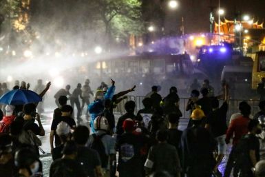 Thai Premier Prayut Chan-O-Cha urged calm after police used water canon against pro-democracy protesters