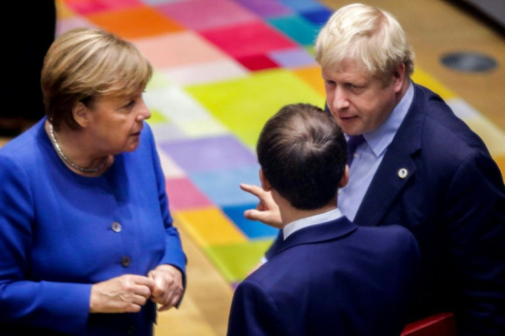 British Prime Minister Boris Johnson, French President Emmanuel Macron and German Chancellor Angela Merkel, seen here speaking at a European summit in Brussels in October 2019, have all congratulated US President-elect Joe Biden