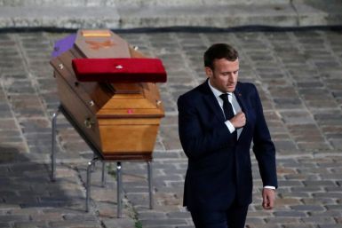 President Emmanuel Macron defended France's strict brand of secularism when he paid tribute to schoolteacher Samuel Paty, who was beheaded after showing his class cartoons of the Prophet Mohammed in a lesson on free speech