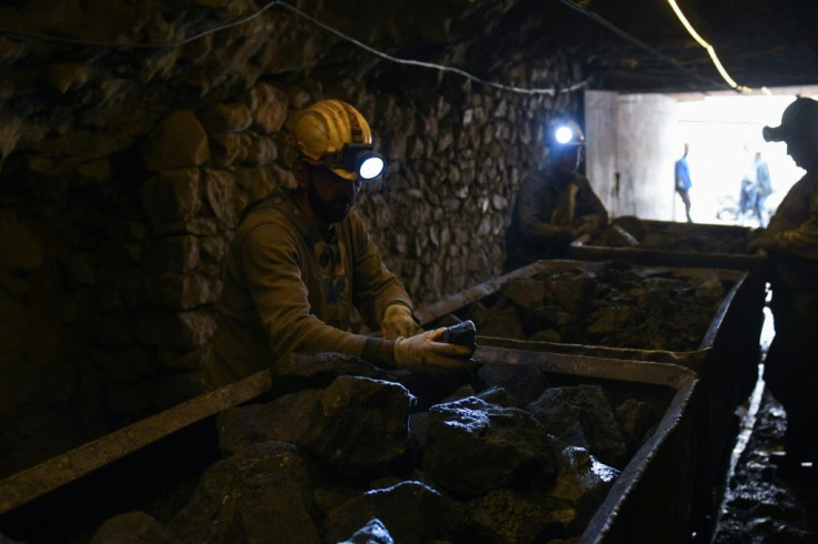 Only about 20 of 130 legally registered firms are continuing to mine because plunging prices no longer cover the costs of production.