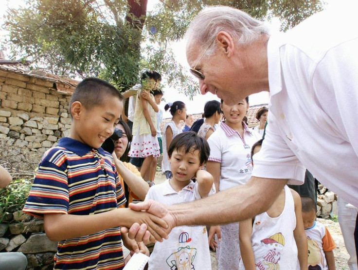 Joe Biden, now US president-elect, stopped at the village of Yanzikou in 2001 and was photographed shaking hands with Gao Shan, then nine years old