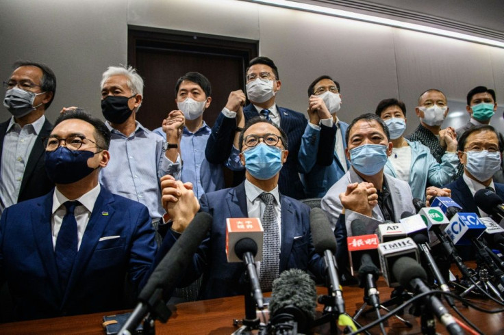 Hong Kong's pro-democracy lawmakers announced their intention to resign