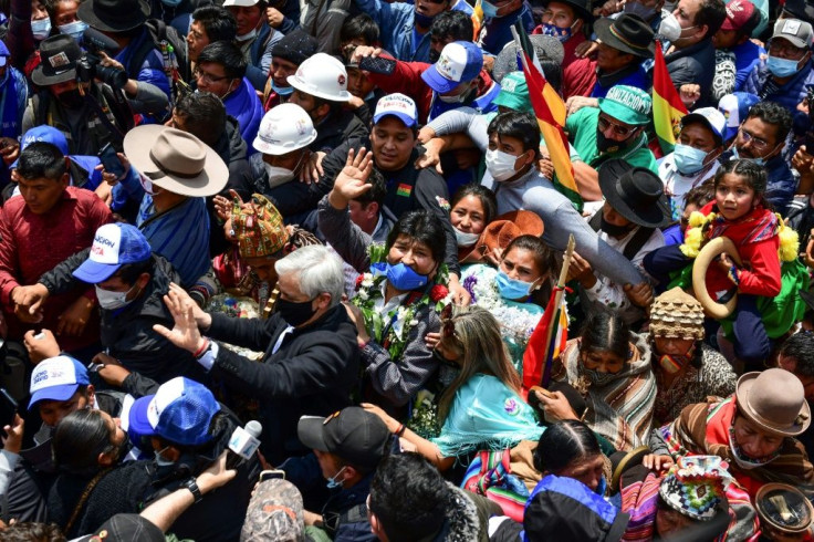 Ex-president Evo Morales is mobbed by supporters during his homecoming tour in Villazon, southern Bolivia, in November 2020