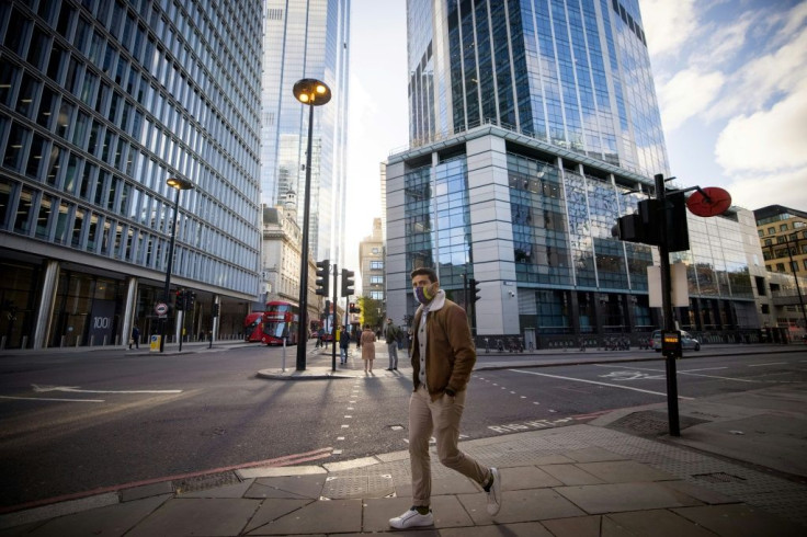 A deserted street in the City of London. University students in England will be allowed to travel home in early December after a four-week lockdown is eased to spend Christmas with their families