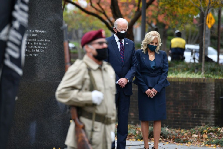 US President-elect Joe Biden and his wife Jill Biden pay their respects during a Veterans Day stop at the Korean War Memorial Park in Philadelphia, Pennsylvania on November 11, 2020