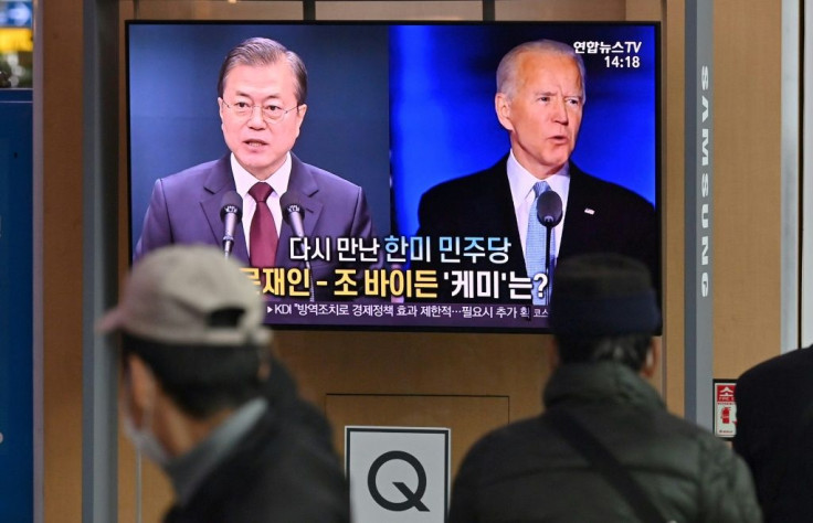 Biden (pictured right) was said to have told Moon Jae-in (left) that the US-South Korea alliance was 'the linchpin of security and prosperity' in the region