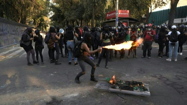 Dozens of protesters gather in front of the Legislature of Quintana Roo in Mexico City to protest against the murder of Bianca Alejandrina Lorenzana Alvarado, "Alexis", and against police firing shots in the air to disperse a demonstration in Cancun