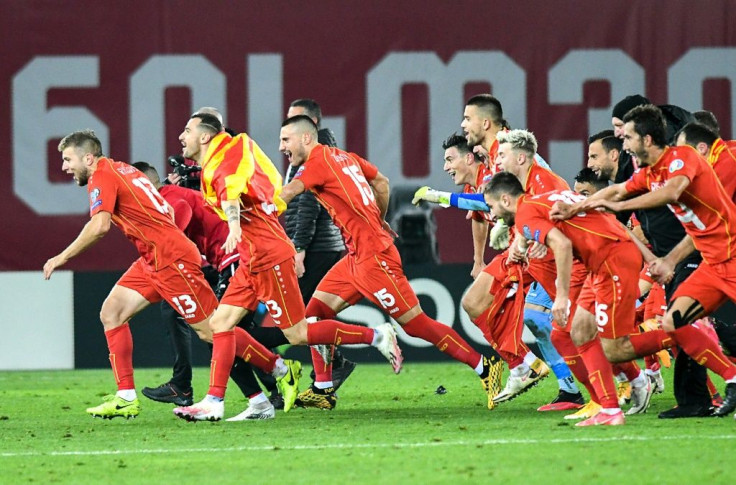 North Macedonia players celebrate after beating Georgia in Tbilisi to qualify for Euro 2020