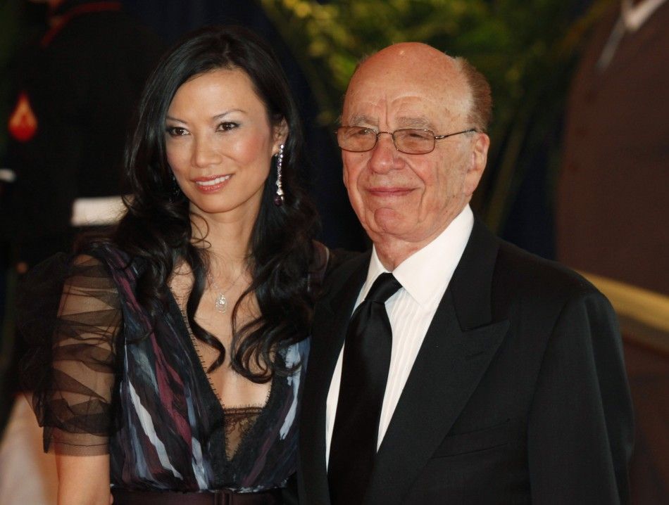 News Corps Chief Executive Murdoch and his wife arrive at the White House Correspondents Association dinner in Washington