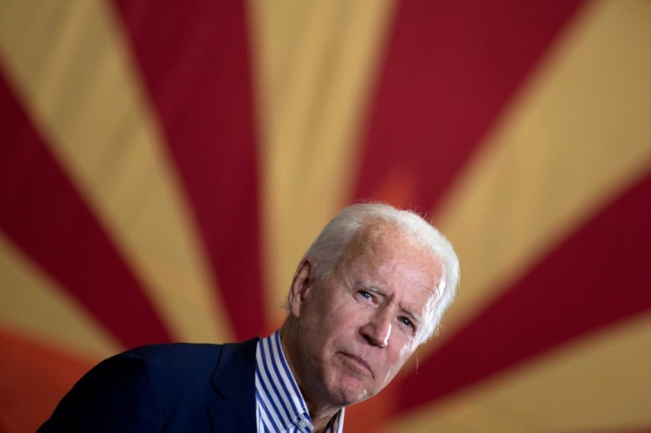 President-elect Joe Biden (pictured in front of Arizona's state flag) has flipped Arizona Democratic for the first time since Bill Clinton's win in 1996
